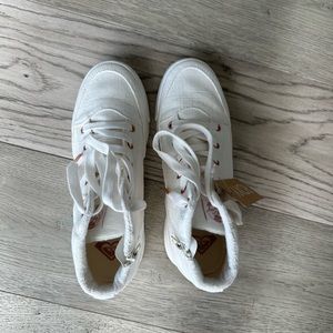 Roxy white wedge tennis shoes. Excellent condition, never worn. Size 9.